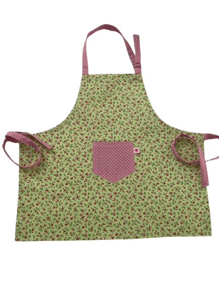 Kinderschürze in Grün mit Blümchen-Muster und rosa Punkte-Tasche